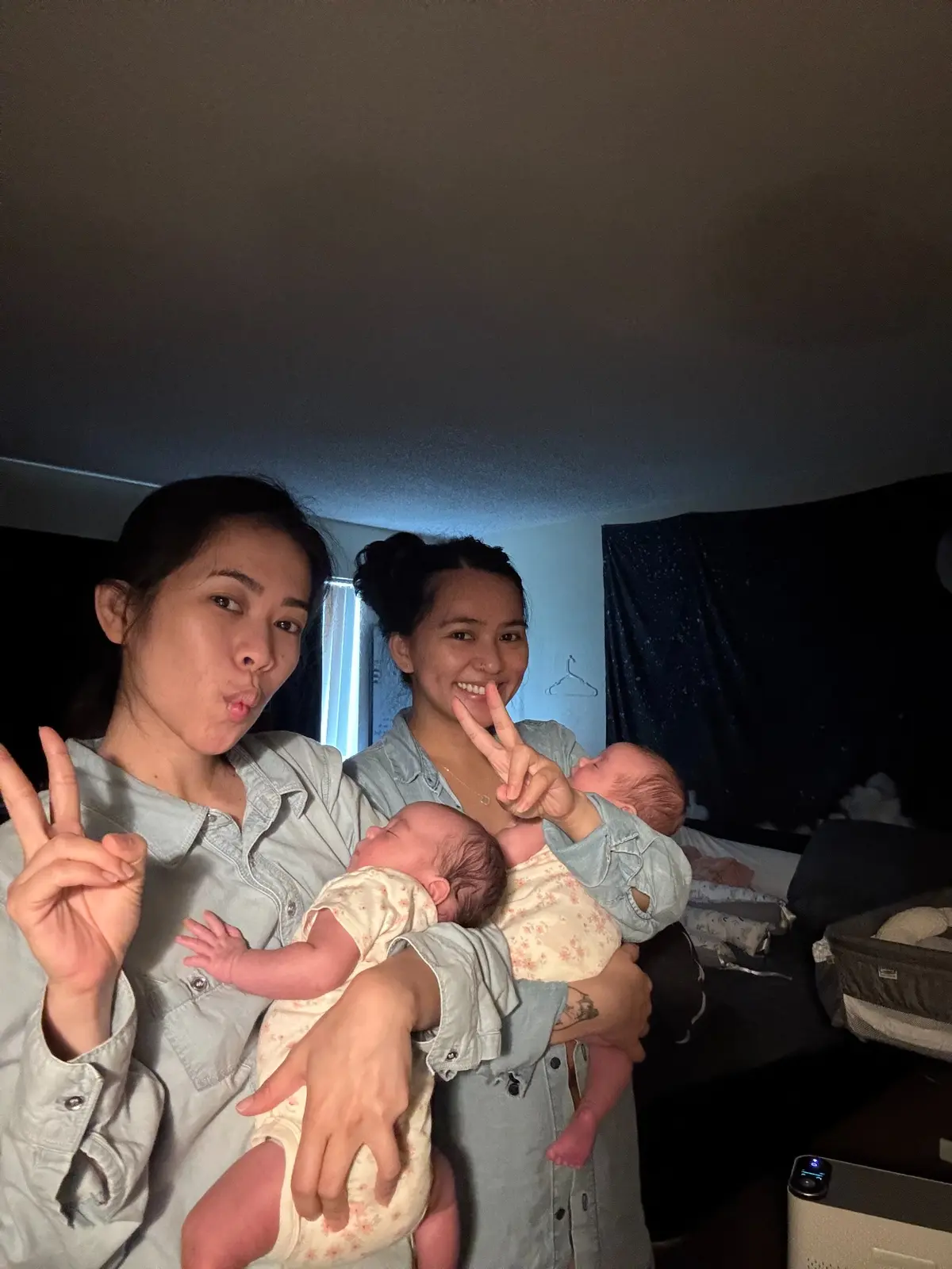 Anne and Vhen together with their newborn twins in the hospital
