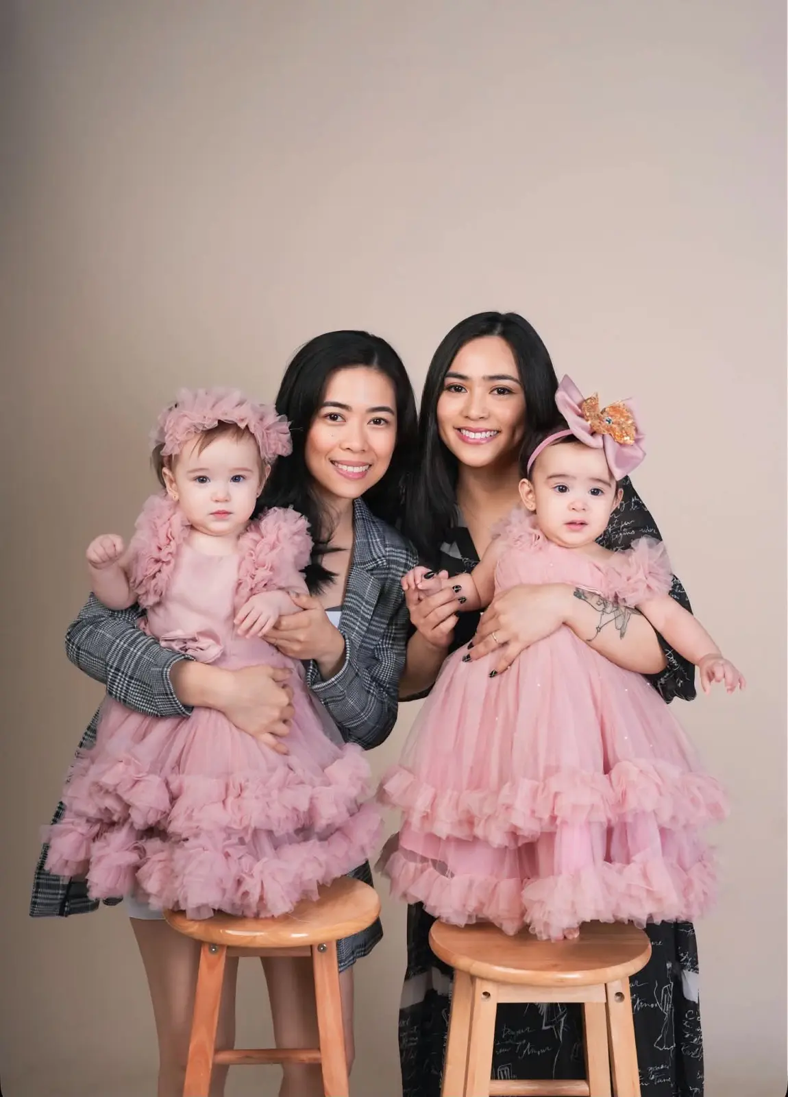 Anne and Vhen with Vaughn and Venice in a studio portrait